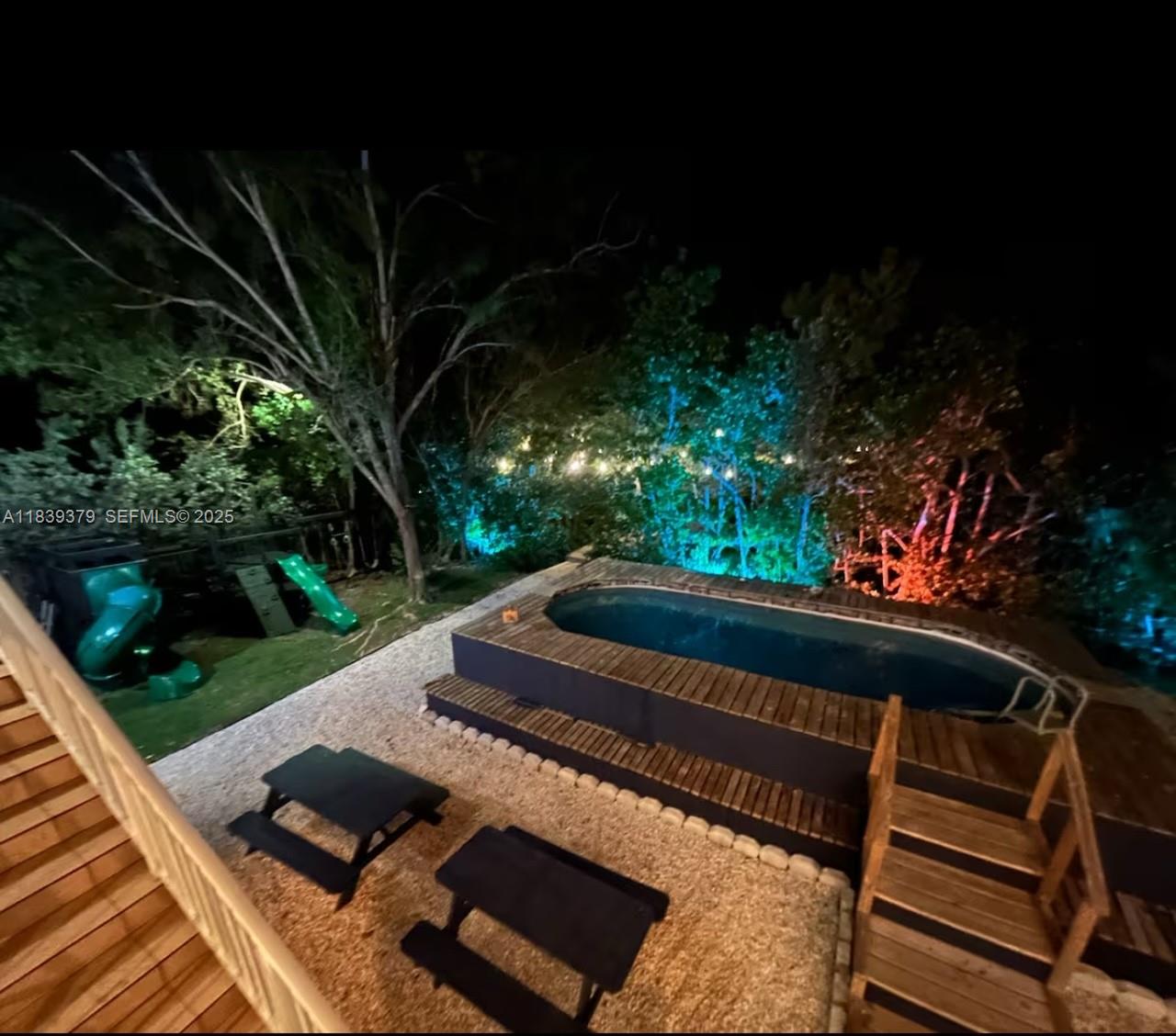 350 Hazel Street, Unit 350 Key Largo, FL 33037 - Photo 11 of 11 a view of a bench in a backyard