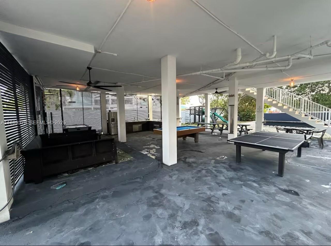 350 Hazel Street, Unit 350 Key Largo, FL 33037 - Photo 6 of 11 a living room with lots of furniture and a large window