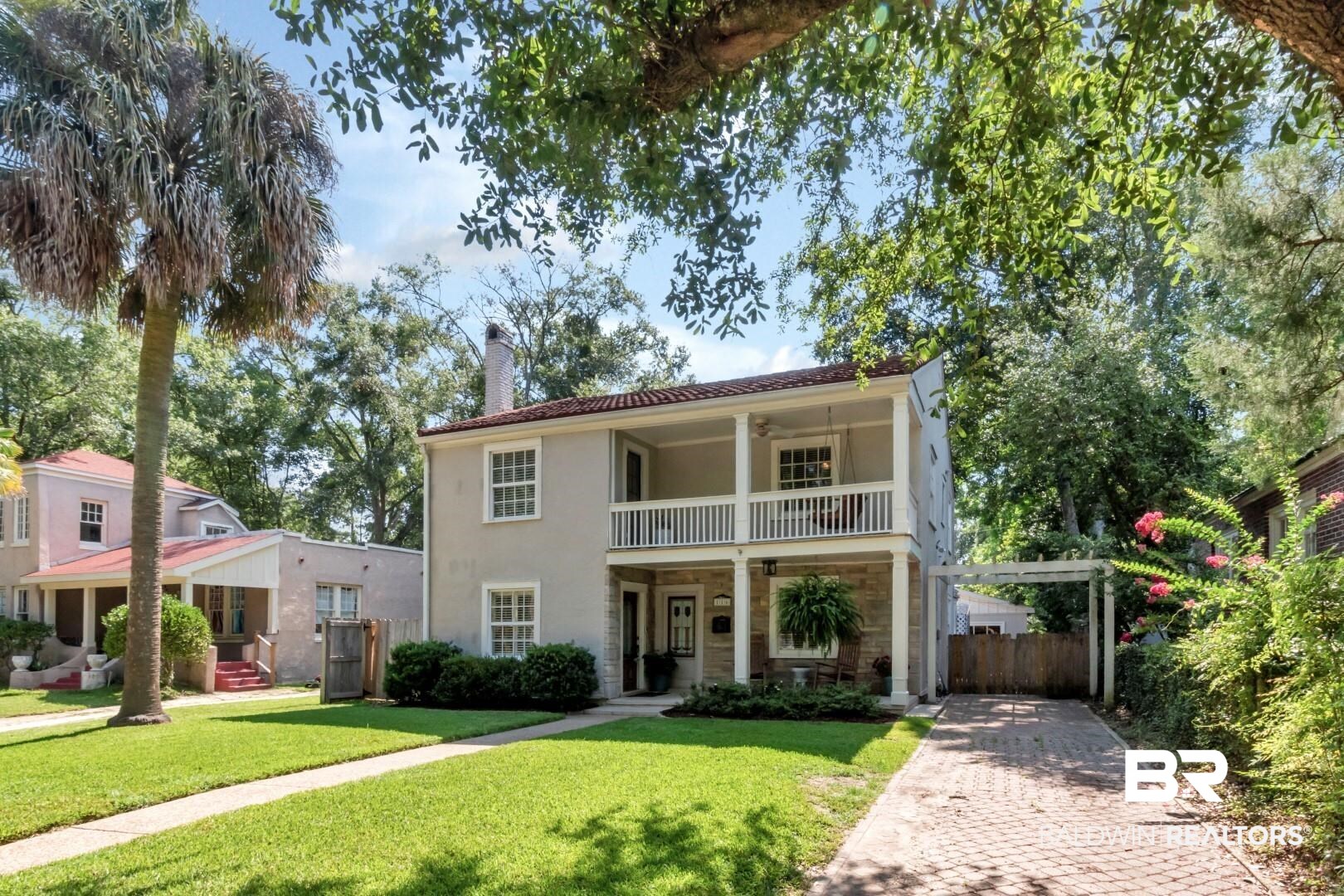 116 Florence Place Mobile, AL 36607 - Photo 2 of 41 Mediterranean / spanish home with a balcony and a front lawn