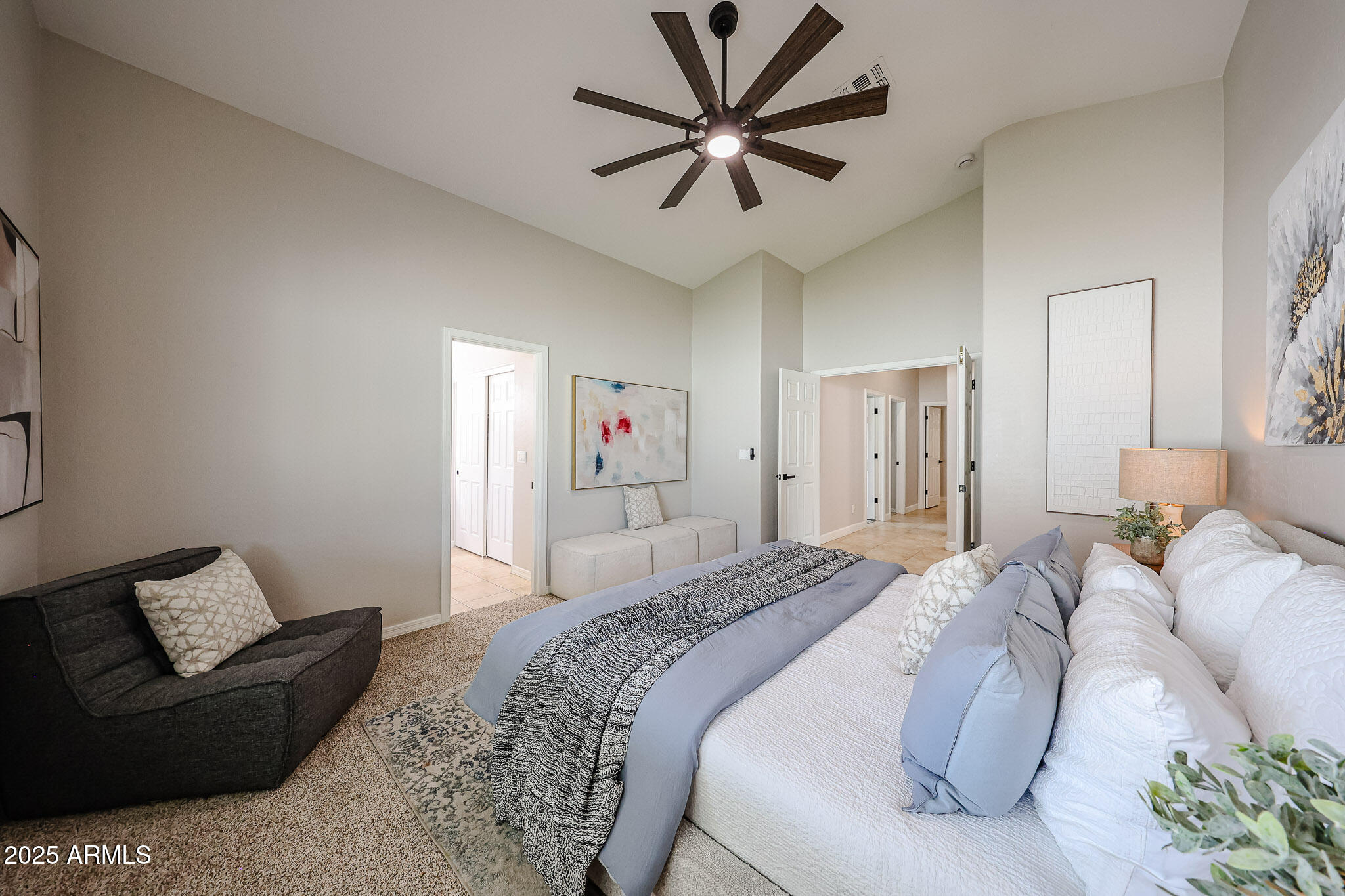 10334 East Diamond Avenue Mesa, AZ 85208 - Photo 16 of 39 a bedroom with a bed and a couch