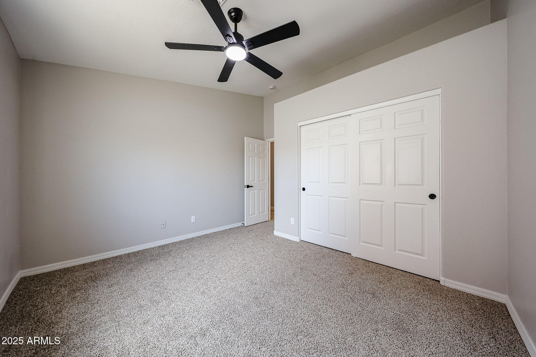 10334 East Diamond Avenue Mesa, AZ 85208 - Photo 22 of 39 an empty room with a ceiling fan and a ceiling fan
