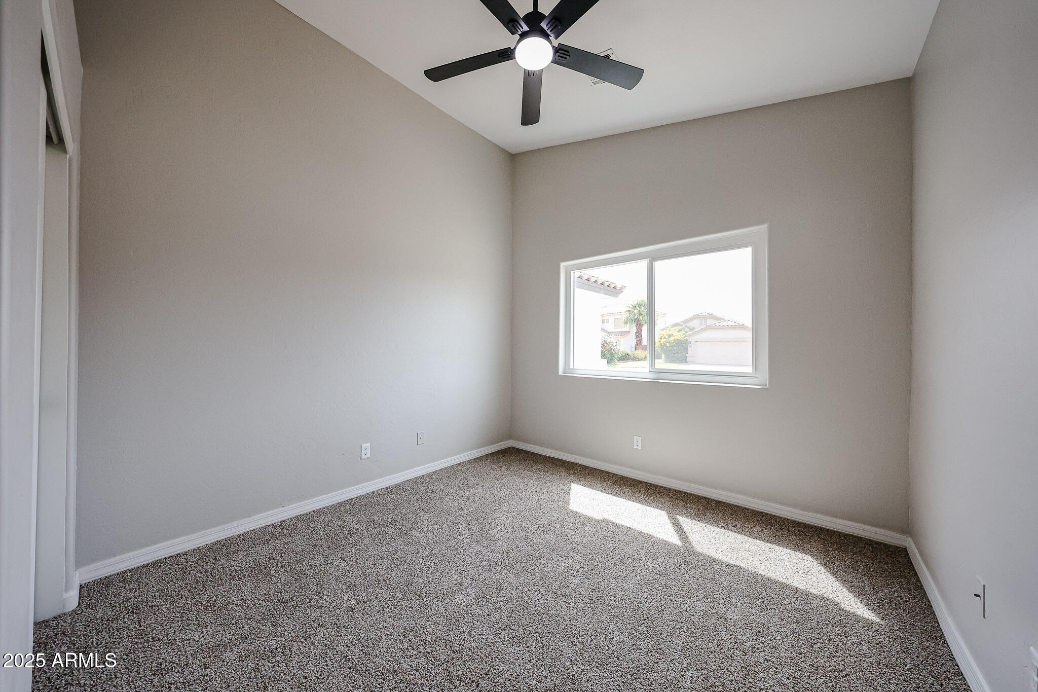 10334 East Diamond Avenue Mesa, AZ 85208 - Photo 25 of 39 an empty room with windows and fan