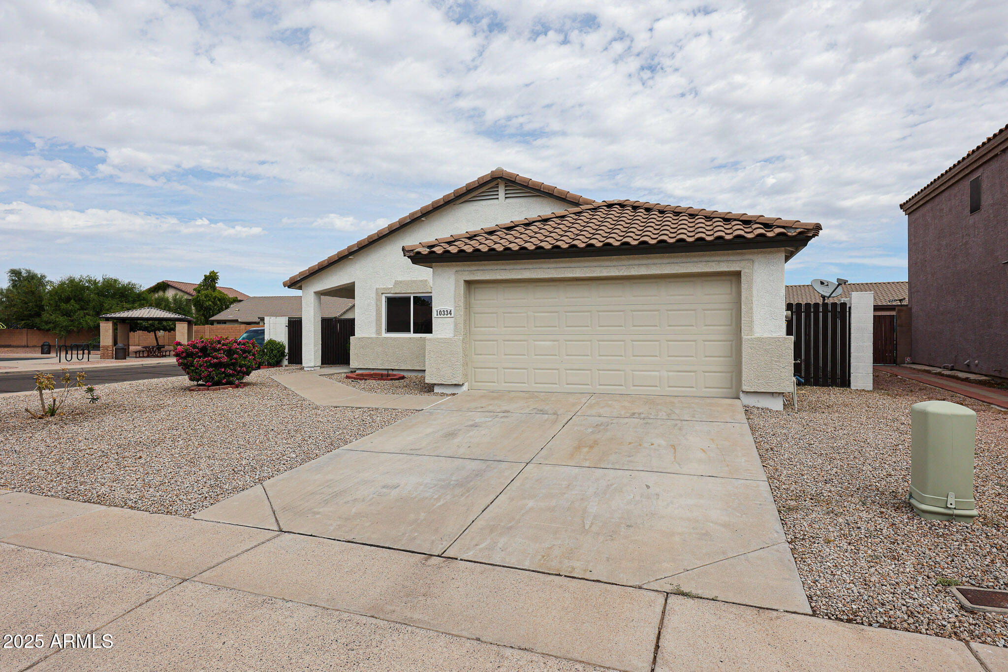 10334 East Diamond Avenue Mesa, AZ 85208 - Photo 34 of 39 a car parked in front of house