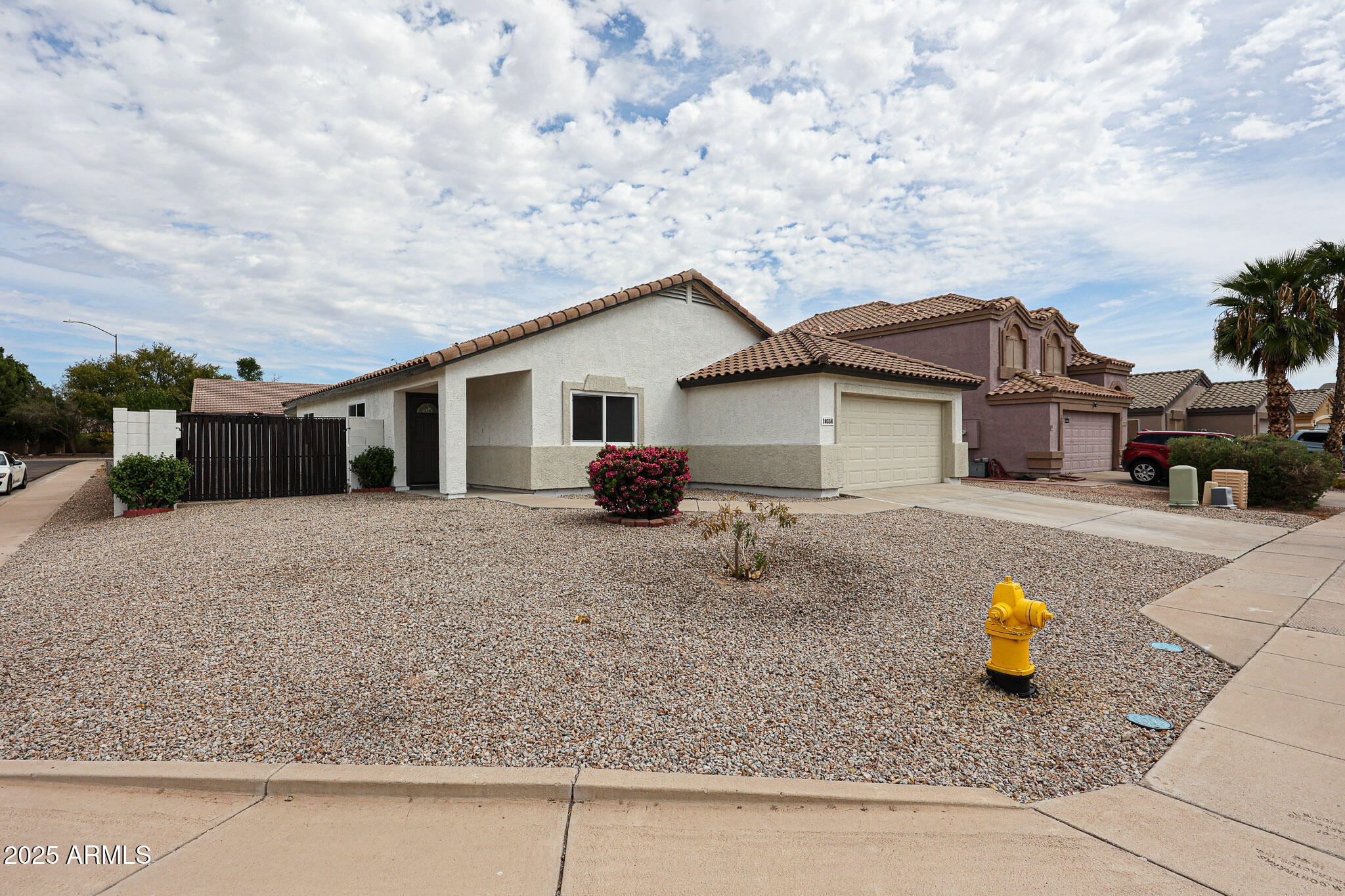 10334 East Diamond Avenue Mesa, AZ 85208 - Photo 35 of 39 a blue and white house with a outdoor space