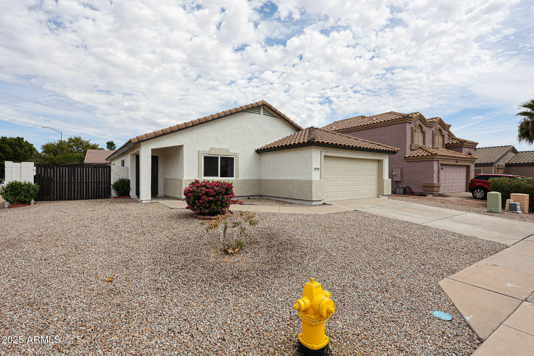 10334 East Diamond Avenue Mesa, AZ 85208 - Photo 36 of 39 a view of a house with backyard and a tree