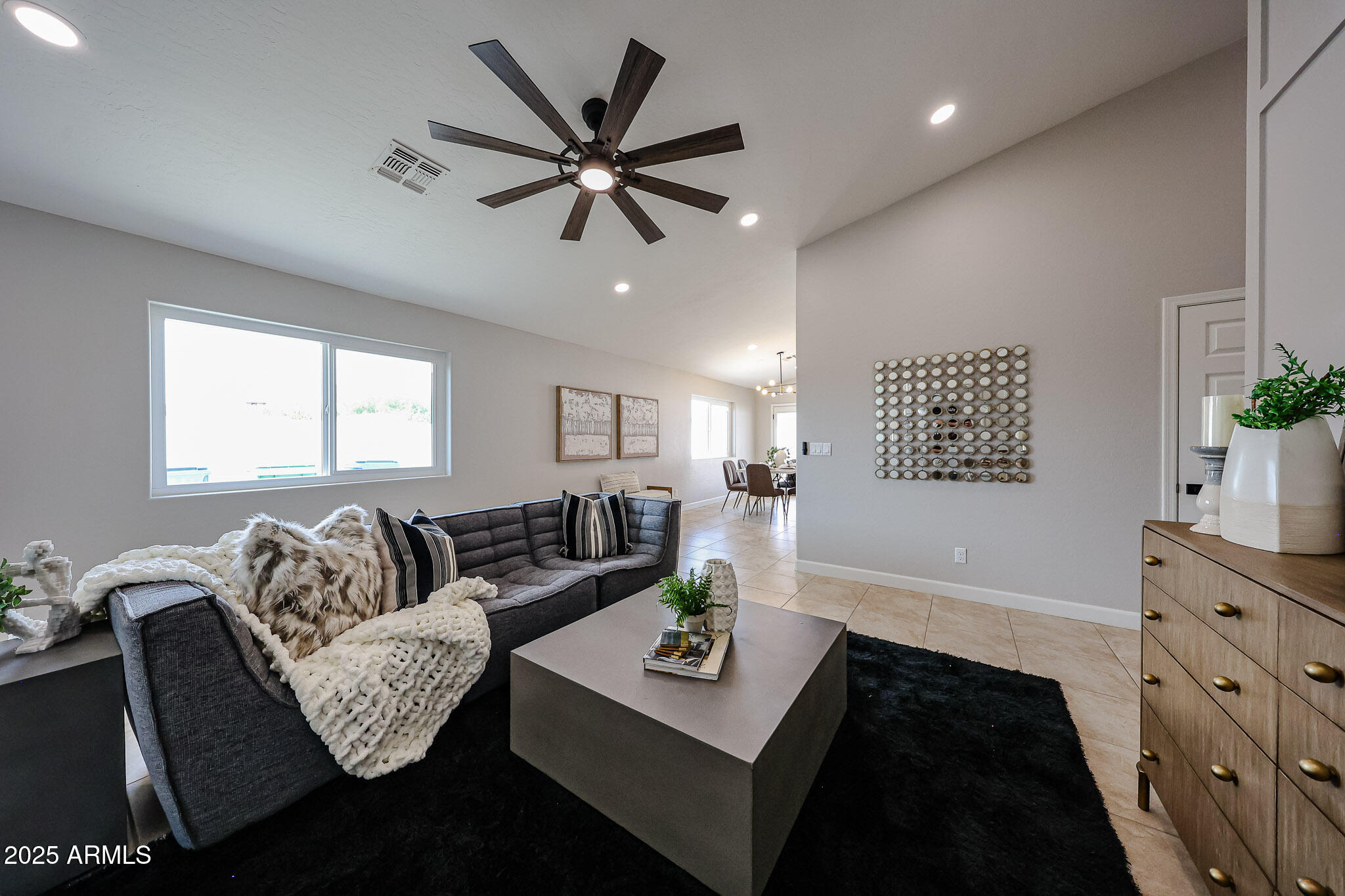 10334 East Diamond Avenue Mesa, AZ 85208 - Photo 5 of 39 a living room with furniture and a wooden floor