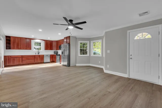 a view of an empty room with a window