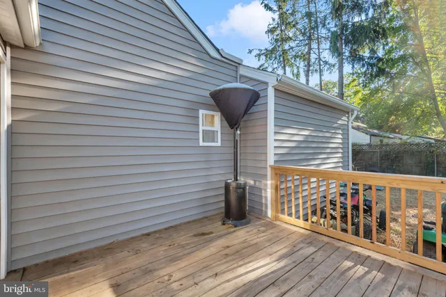 a view of a two chairs in the balcony