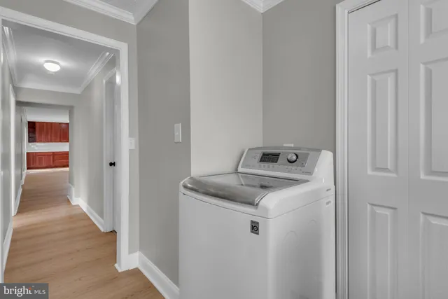 a utility room with washer and dryer