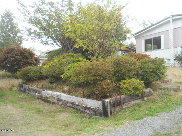 7865 16th Street Bay City, OR 97107 - Photo 2 of 15 Front yard