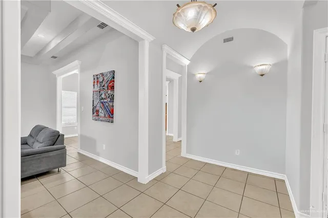 a living room with a couch and a chair