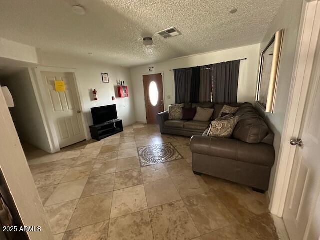 17629 North 36th Street Phoenix, AZ 85032 - Photo 4 of 20 a living room with furniture and a flat screen tv
