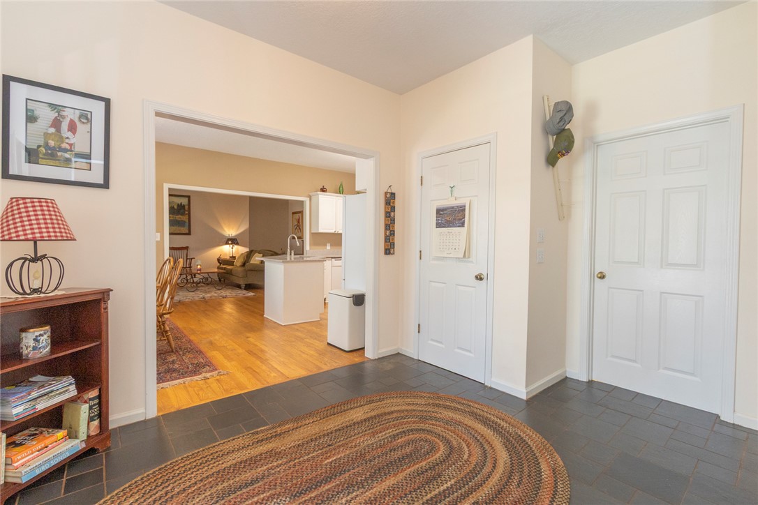 108 Pearman Drive Pendleton, SC 29670 - Photo 26 of 50 This inviting entryway seamlessly connects to the kitchen and living area, offering a warm welcome.