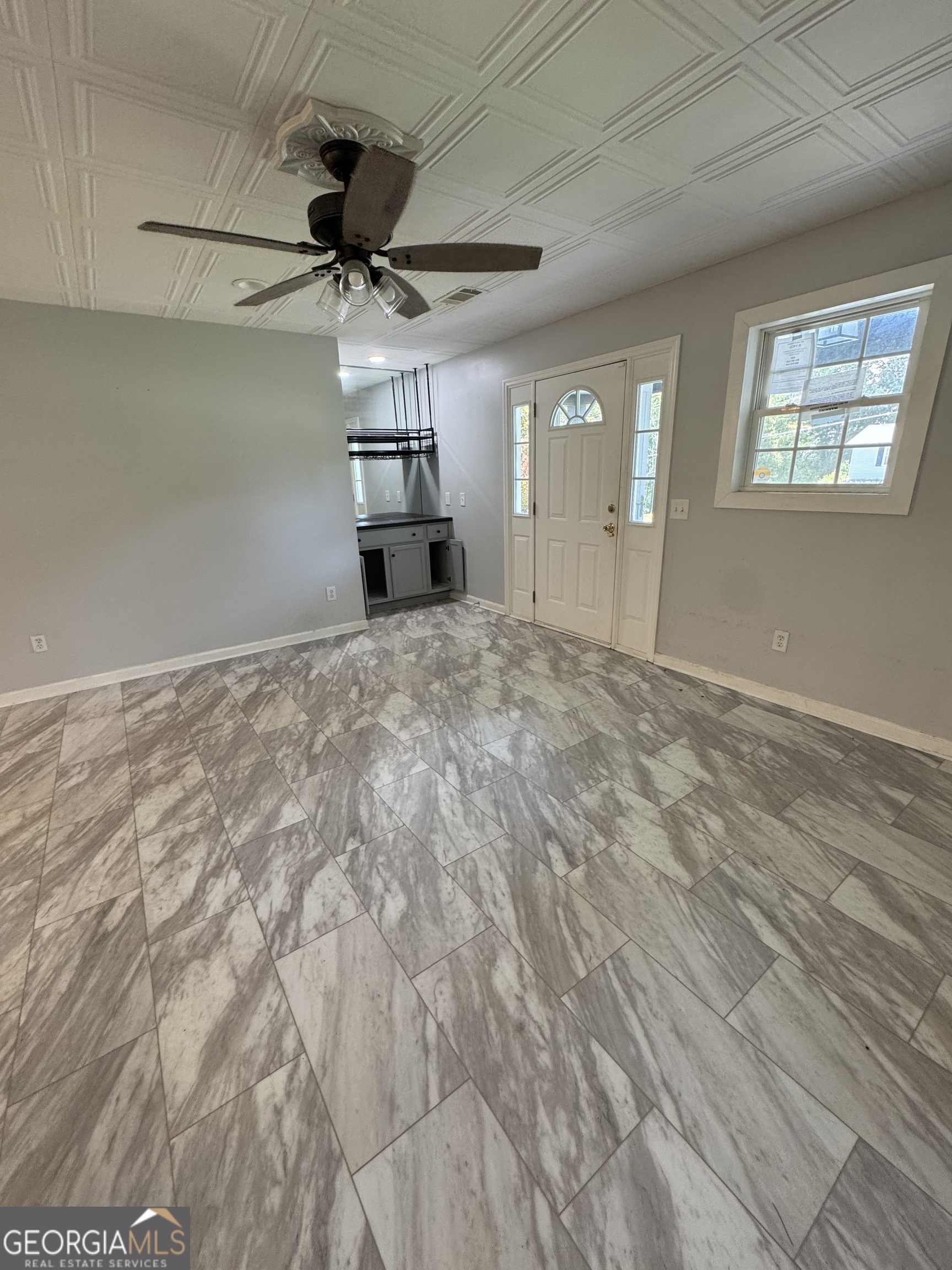 7223 Scenic Heights Road Manchester, GA 31816 - Photo 17 of 23 a view of empty room with wooden floor and ceiling fan