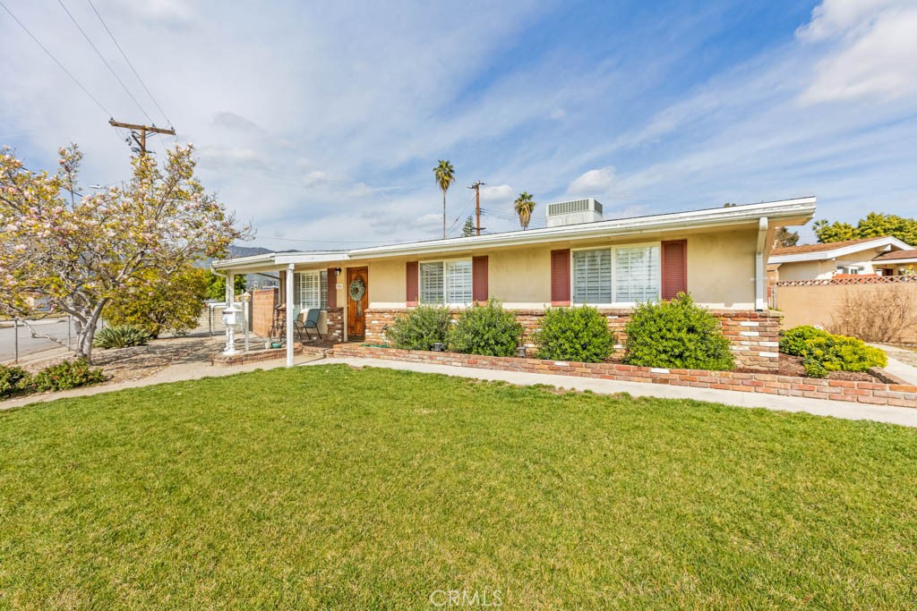 954 Delay Avenue Glendora, CA 91740 - Photo 1 of 35 a front view of a house with a yard