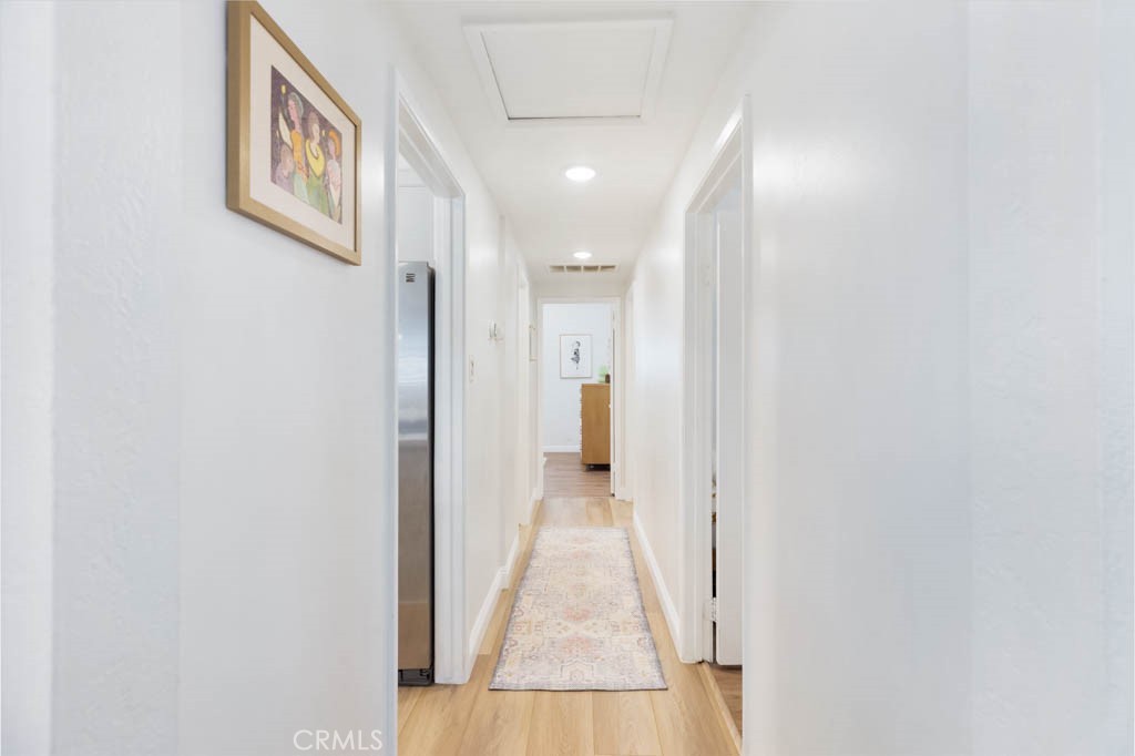 954 Delay Avenue Glendora, CA 91740 - Photo 19 of 35 a view of a hallway with wooden floor