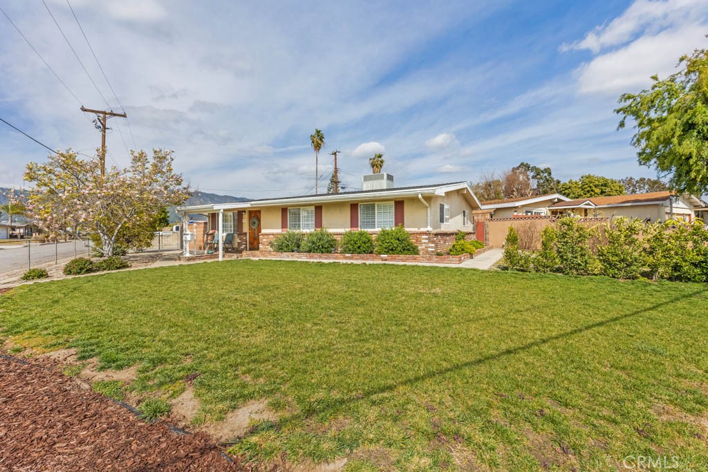 954 Delay Avenue Glendora, CA 91740 - Photo 2 of 35 a front view of a house with a yard