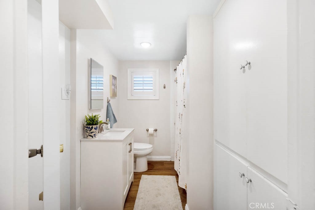 954 Delay Avenue Glendora, CA 91740 - Photo 22 of 35 a bathroom with a toilet and a shower