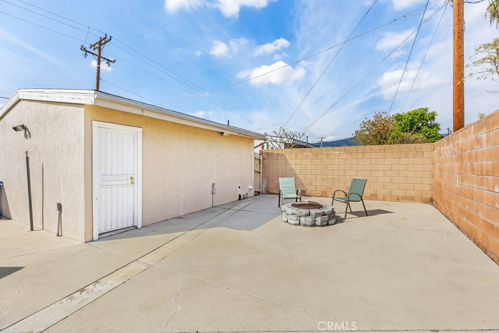 954 Delay Avenue Glendora, CA 91740 - Photo 30 of 35 a view of a patio with a table and chairs