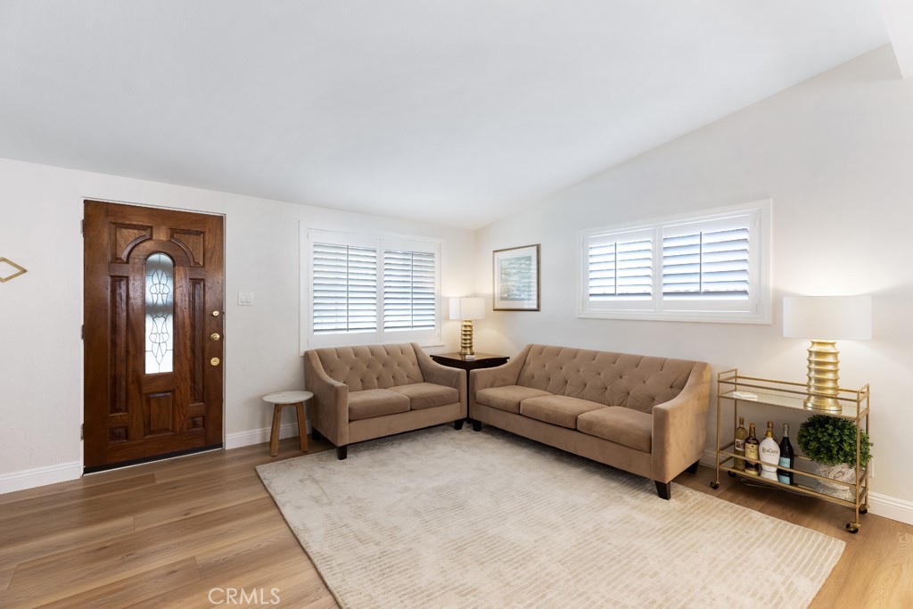 954 Delay Avenue Glendora, CA 91740 - Photo 5 of 35 a living room with furniture and a potted plant