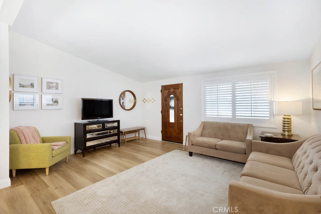 954 Delay Avenue Glendora, CA 91740 - Photo 7 of 35 a living room with furniture and a flat screen tv