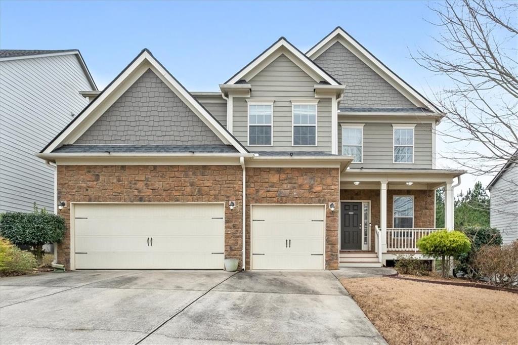 556 Olympic Way Acworth, GA 30102 - Photo 1 of 41 a front view of a house with a yard