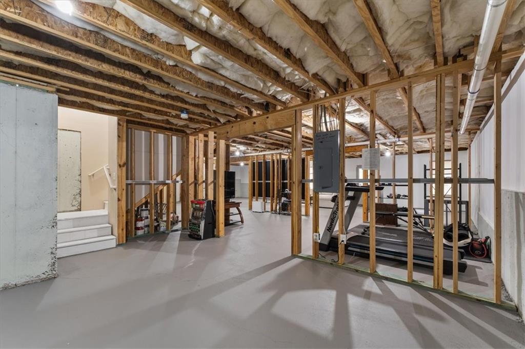 556 Olympic Way Acworth, GA 30102 - Photo 32 of 41 a view of an empty room with gym equipment