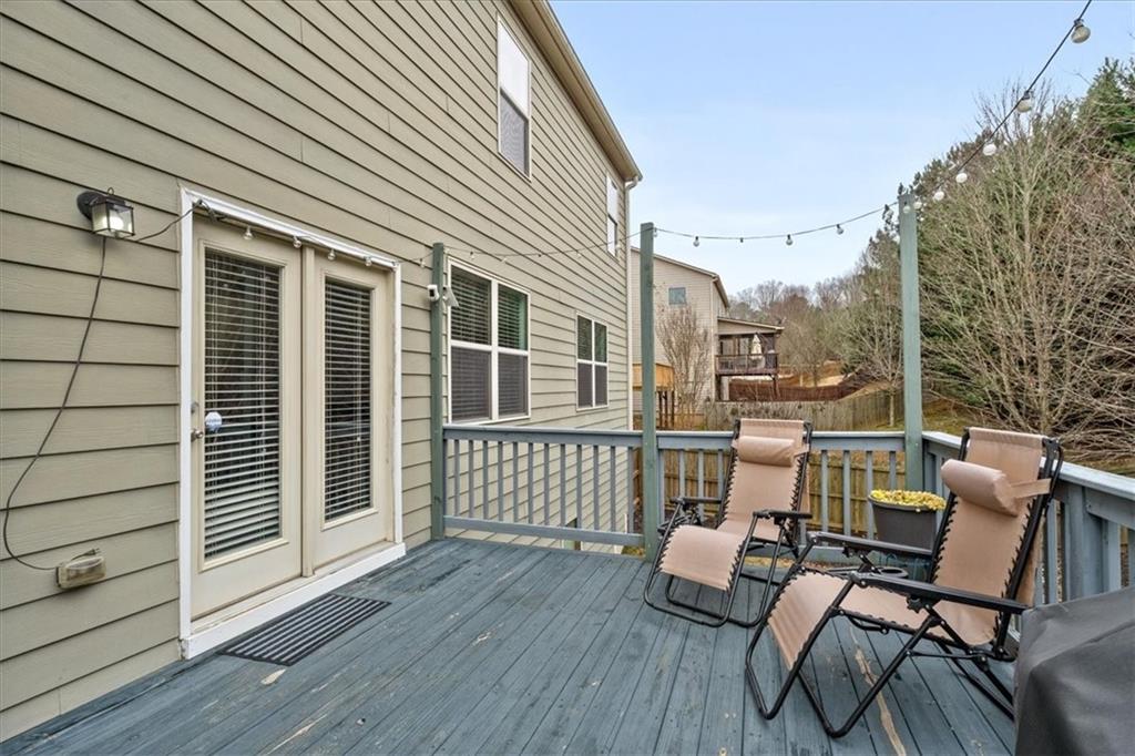 556 Olympic Way Acworth, GA 30102 - Photo 35 of 41 a view of a patio with wooden floor