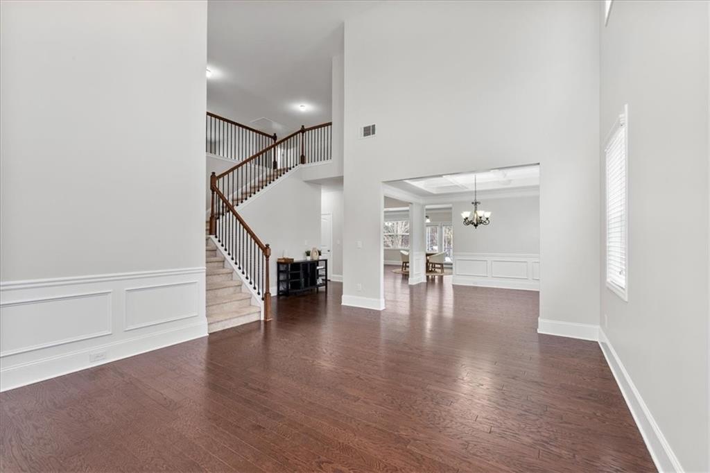556 Olympic Way Acworth, GA 30102 - Photo 4 of 41 a view of an entryway with wooden floor