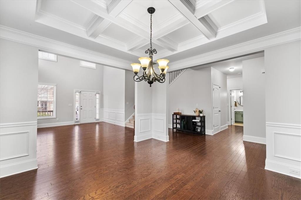 556 Olympic Way Acworth, GA 30102 - Photo 7 of 41 a view of a dining room with furniture and wooden floor