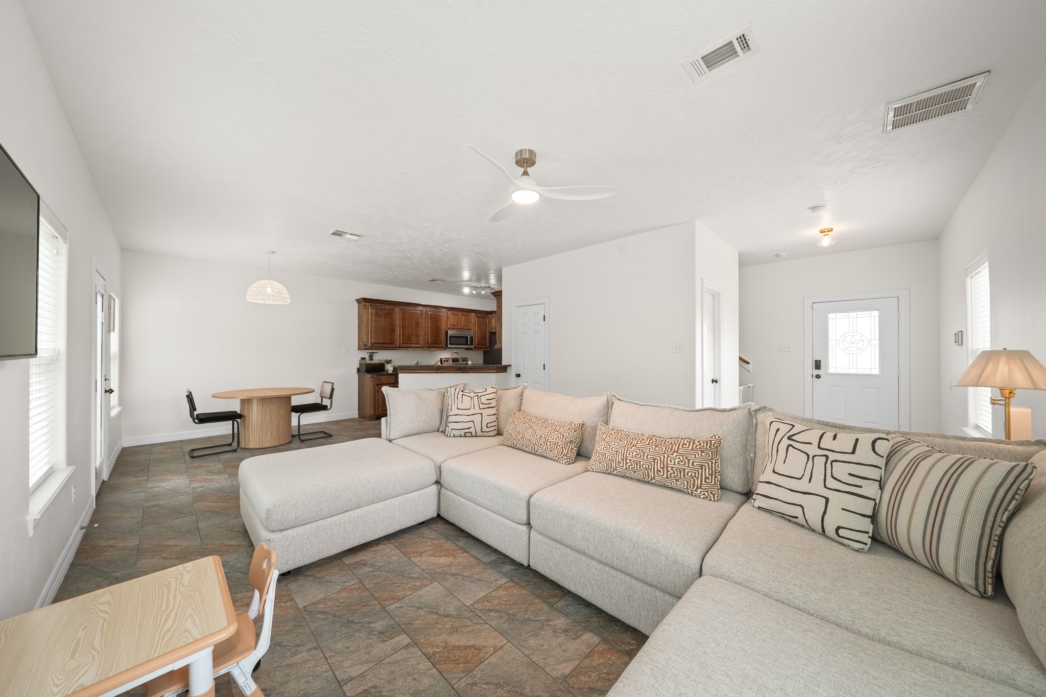 6101 Fox Ridge Drive Angleton, TX 77515 - Photo 12 of 30 a living room with furniture white walls and a fireplace