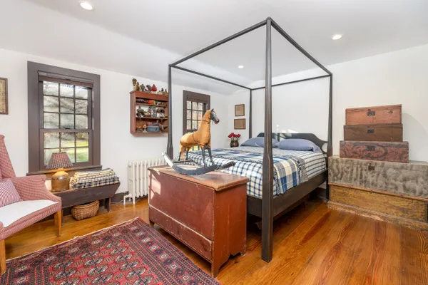 a bed room with a bed and a couch