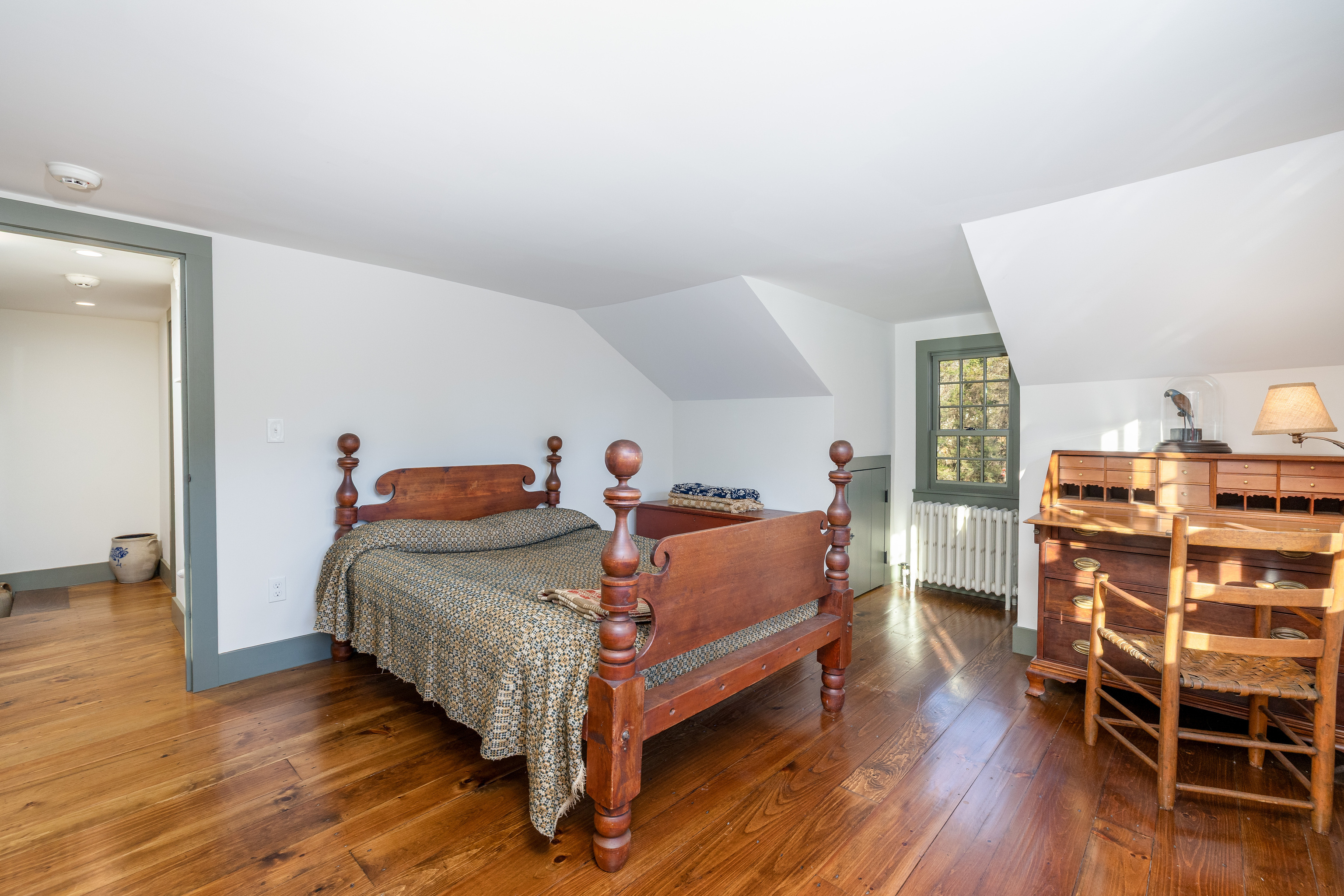 38 Old Turnpike Road Litchfield, CT 06750 - Photo 18 of 34 a bedroom with a bed and wooden floor