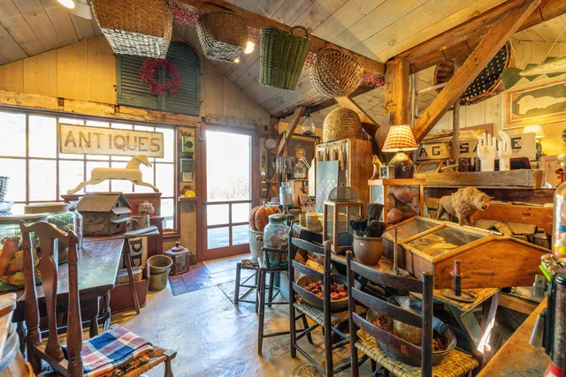 a view of a chairs and table in the patio