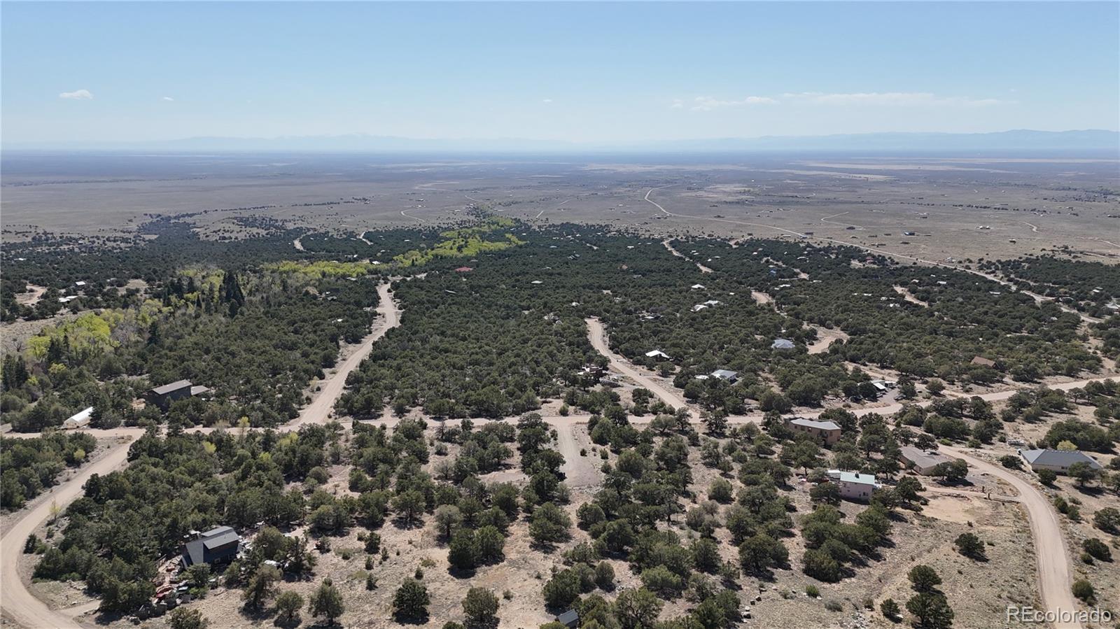 4229 Radiant Crestone, CO 81131 - Photo 25 of 25 an aerial view of house with yard and mountain view in back