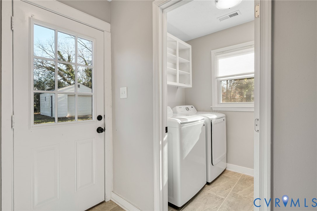 511 Crieff Road Richmond, VA 23225 - Photo 22 of 26 Laundry room featuring washer and dryer and basebo