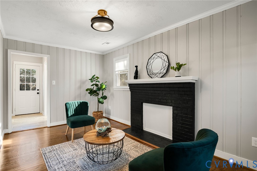 511 Crieff Road Richmond, VA 23225 - Photo 8 of 26 Sitting room featuring ornamental molding, a firep