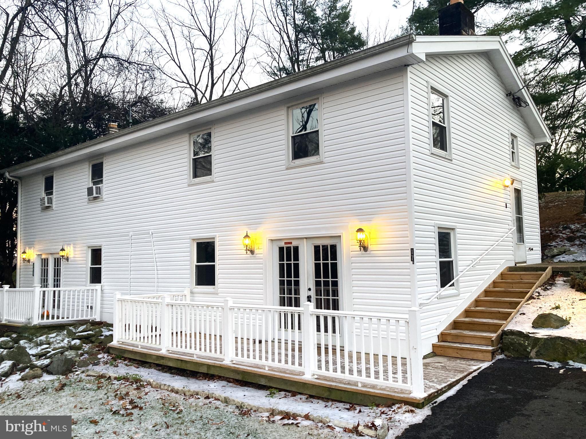 a view of a house with a deck