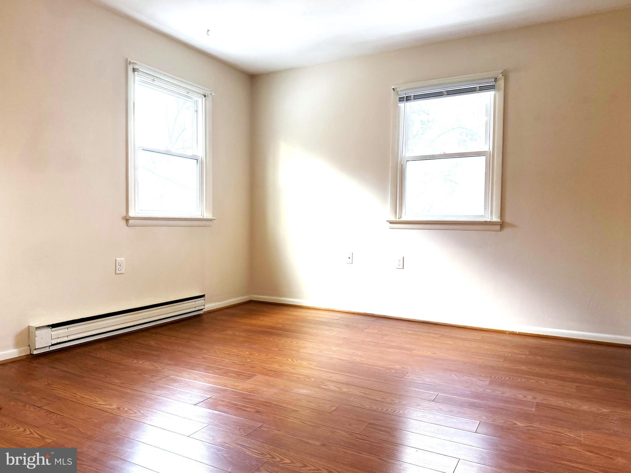 17 Mountain View Trail Fairfield, PA 17320 - Photo 11 of 23 an empty room with wooden floor and windows