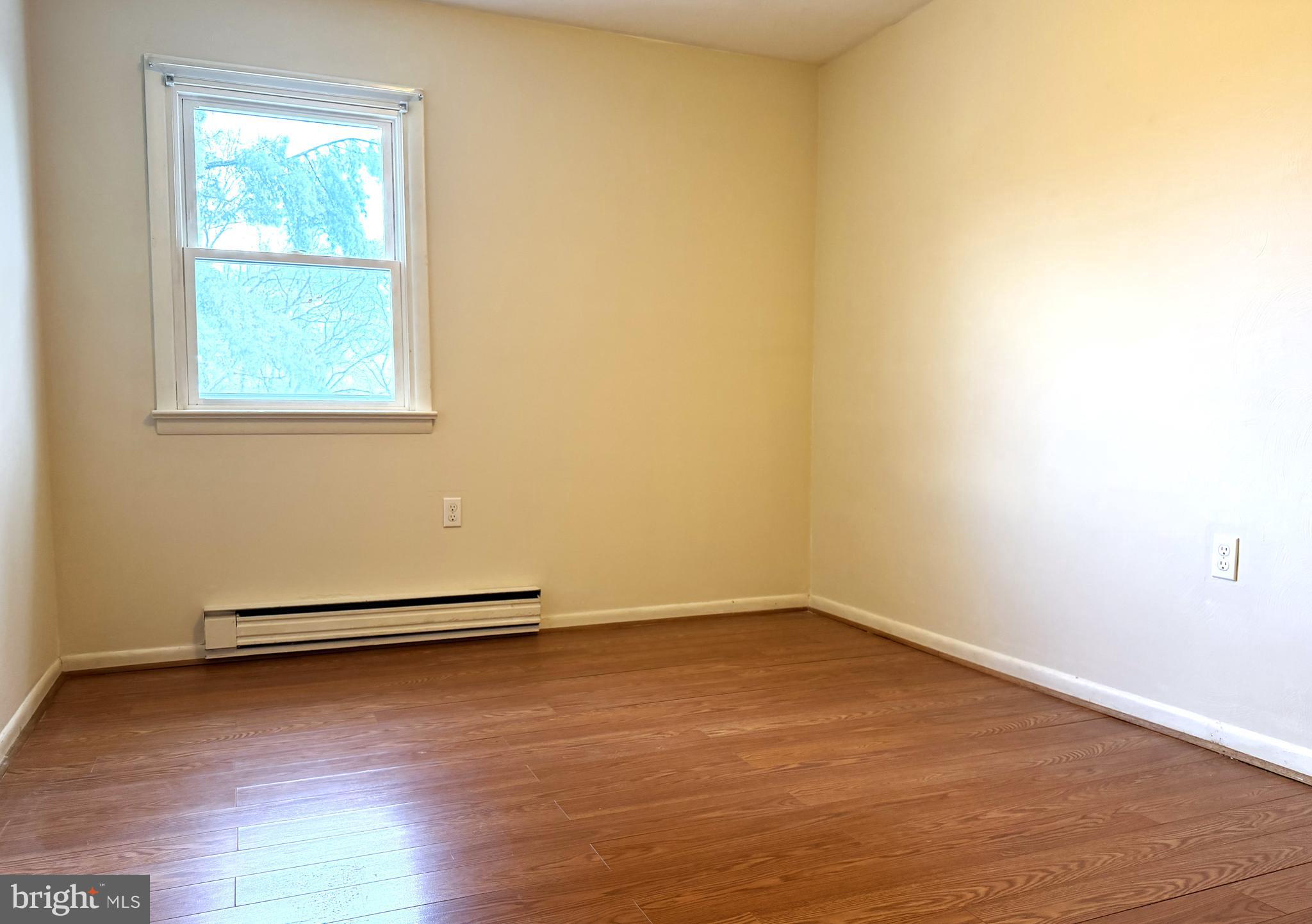 17 Mountain View Trail Fairfield, PA 17320 - Photo 12 of 23 an empty room with wooden floor and windows