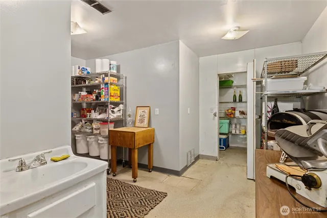 a view of a workspace with furniture and toys