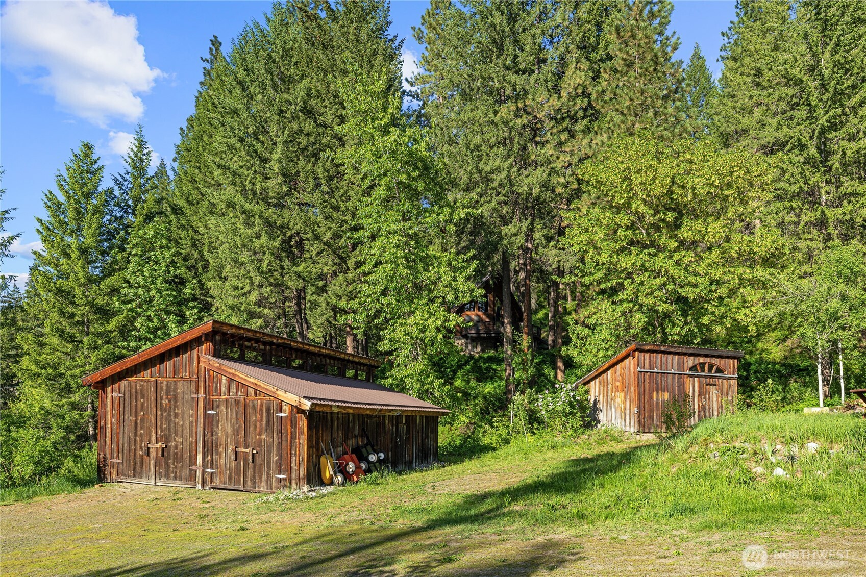 4265 Highway 97 Peshastin, WA 98847 - Photo 3 of 38 a front view of a house with a garden