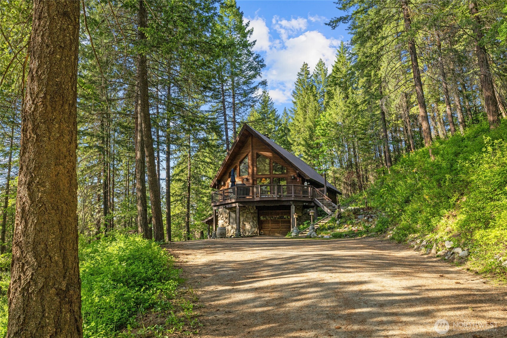 4265 Highway 97 Peshastin, WA 98847 - Photo 35 of 38 a front view of a house with a garden