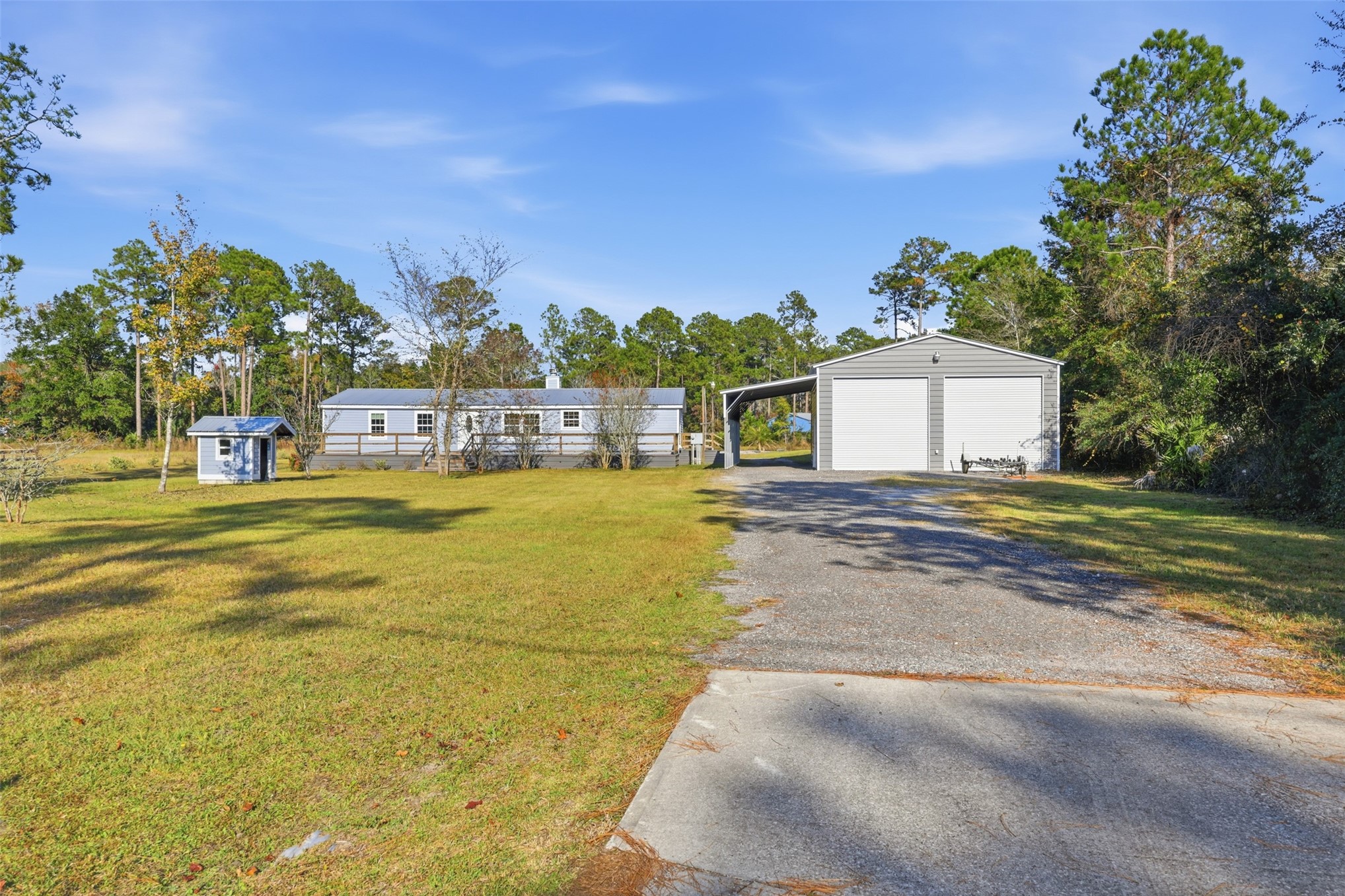 85232 Burmeister Road Fernandina Beach, FL 32034 - Photo 1 of 32 a view of a house with a big yard