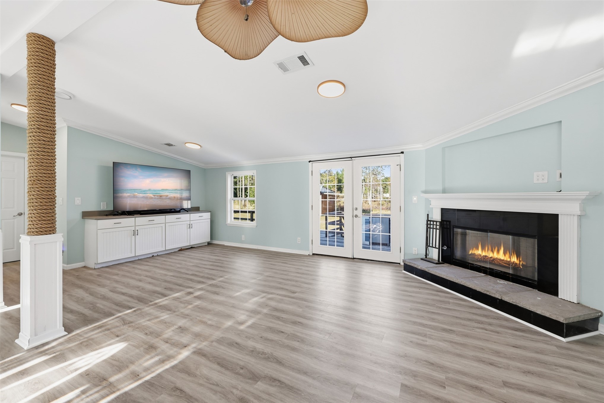 85232 Burmeister Road Fernandina Beach, FL 32034 - Photo 14 of 32 a living room with furniture and a fireplace