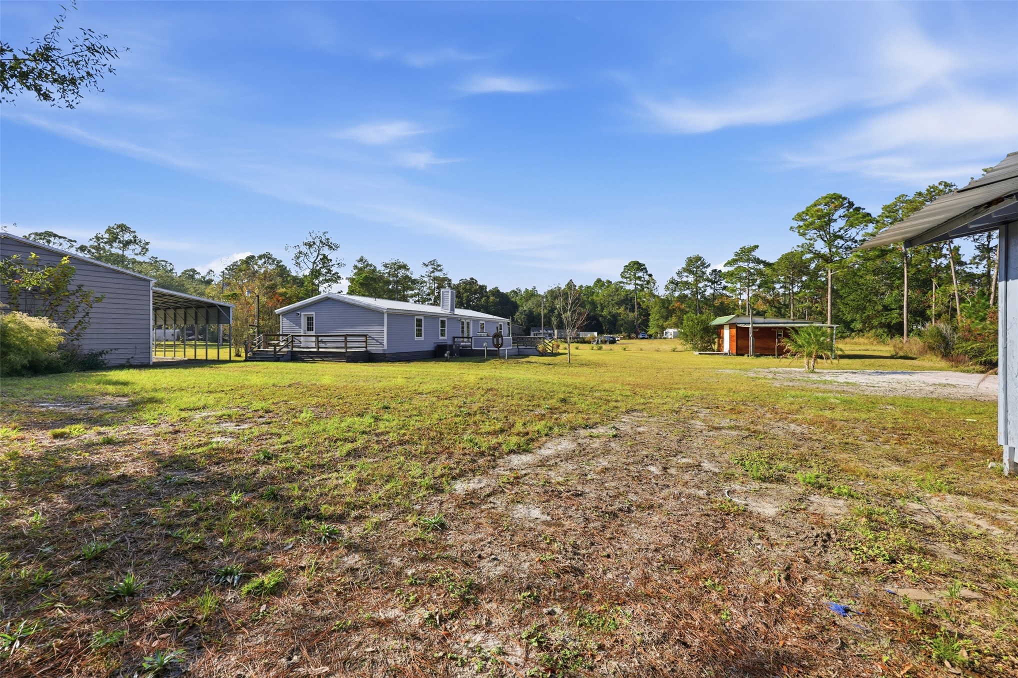 85232 Burmeister Road Fernandina Beach, FL 32034 - Photo 24 of 32 a view of a house with a yard