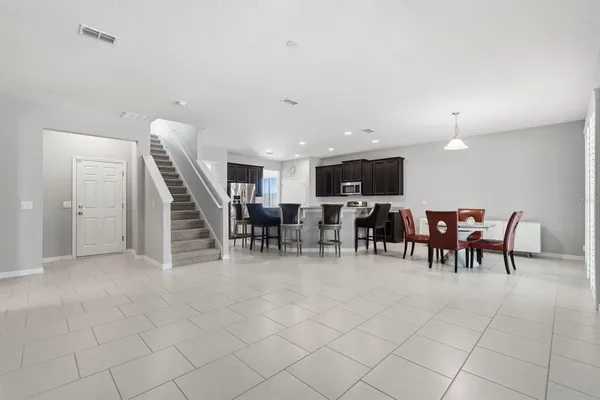 a view of a dining room with furniture