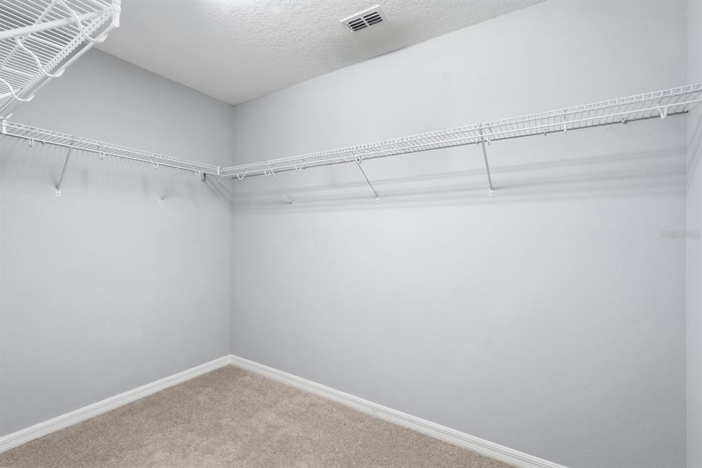 1457 Osprey Ridge Drive Eustis, FL 32736 - Photo 41 of 54 a view of a room with racks on the wall