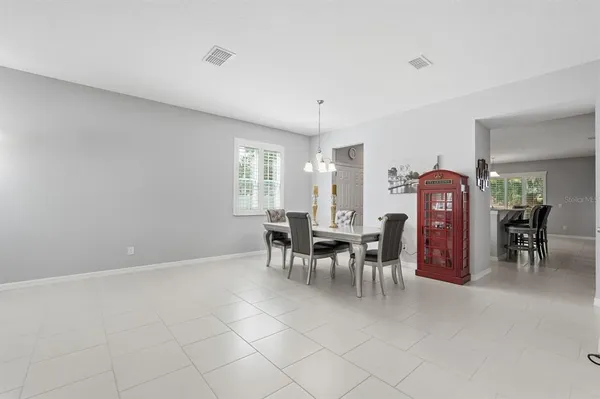 a dining room with furniture and a dining table