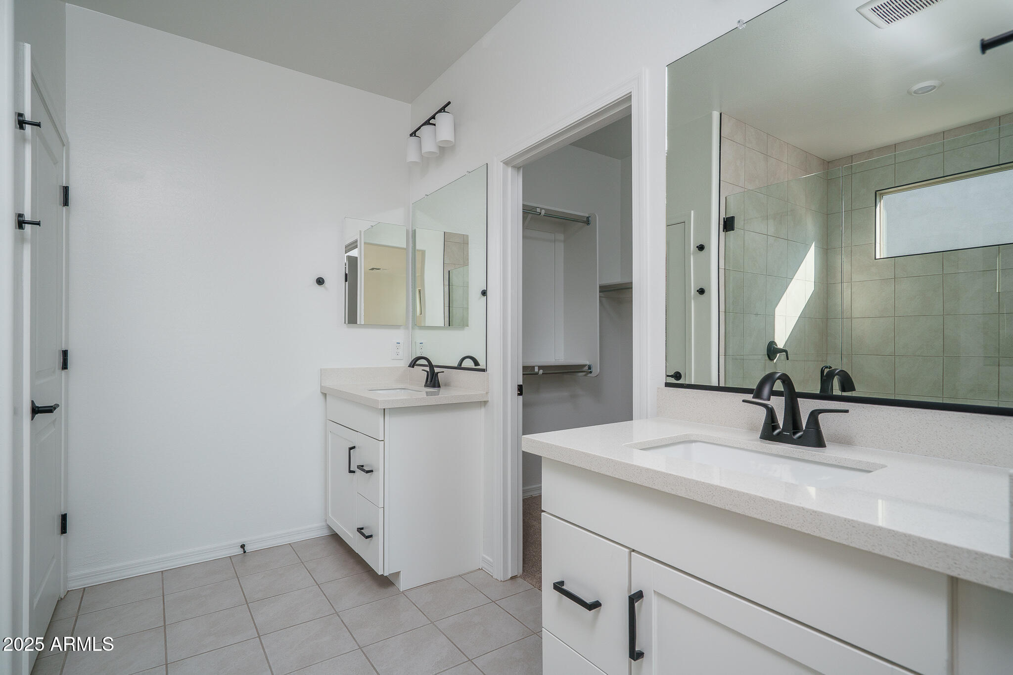 20607 West Rancho Drive Buckeye, AZ 85396 - Photo 14 of 32 a bathroom with a sink and a mirror